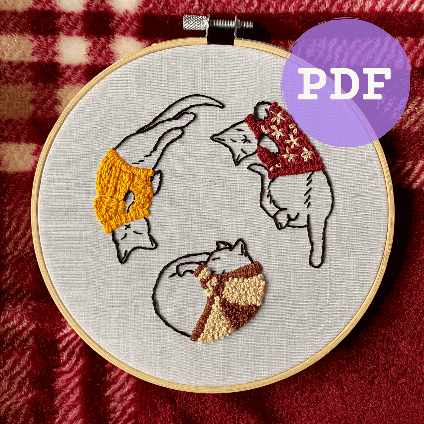 Cozy Sweater Kitties Embroidery PDF Pattern with cats in colorful sweaters in hoop.