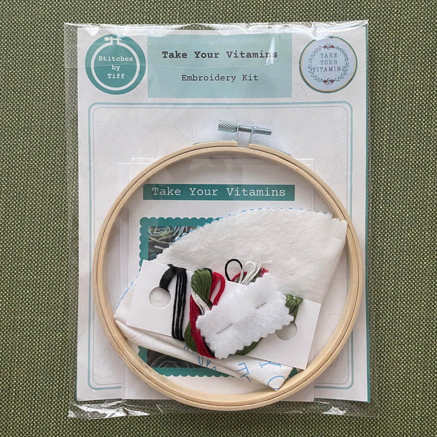 Embroidery kit with bamboo hoop, preprinted fabric, and thread for beginners.