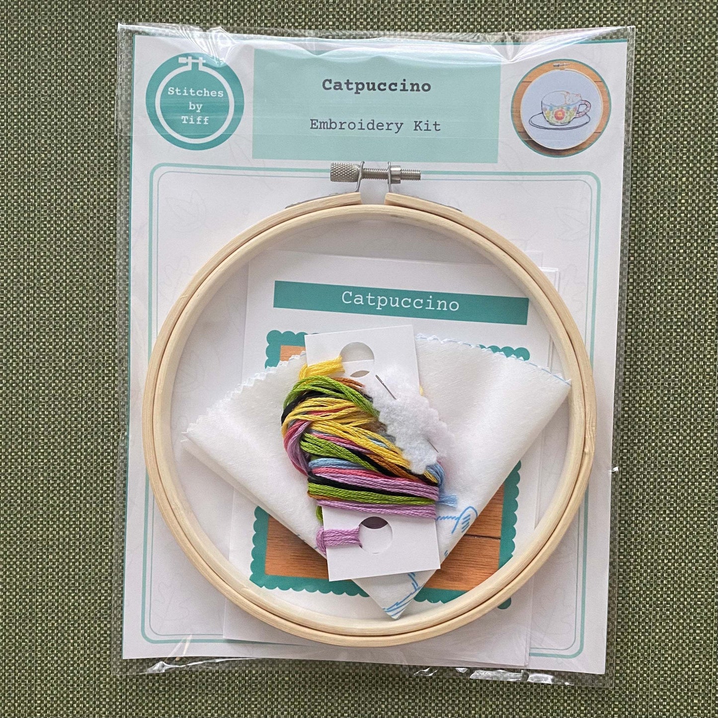 Catpuccino Embroidery Kit with hoop, fabric, needle, and thread for beginners.