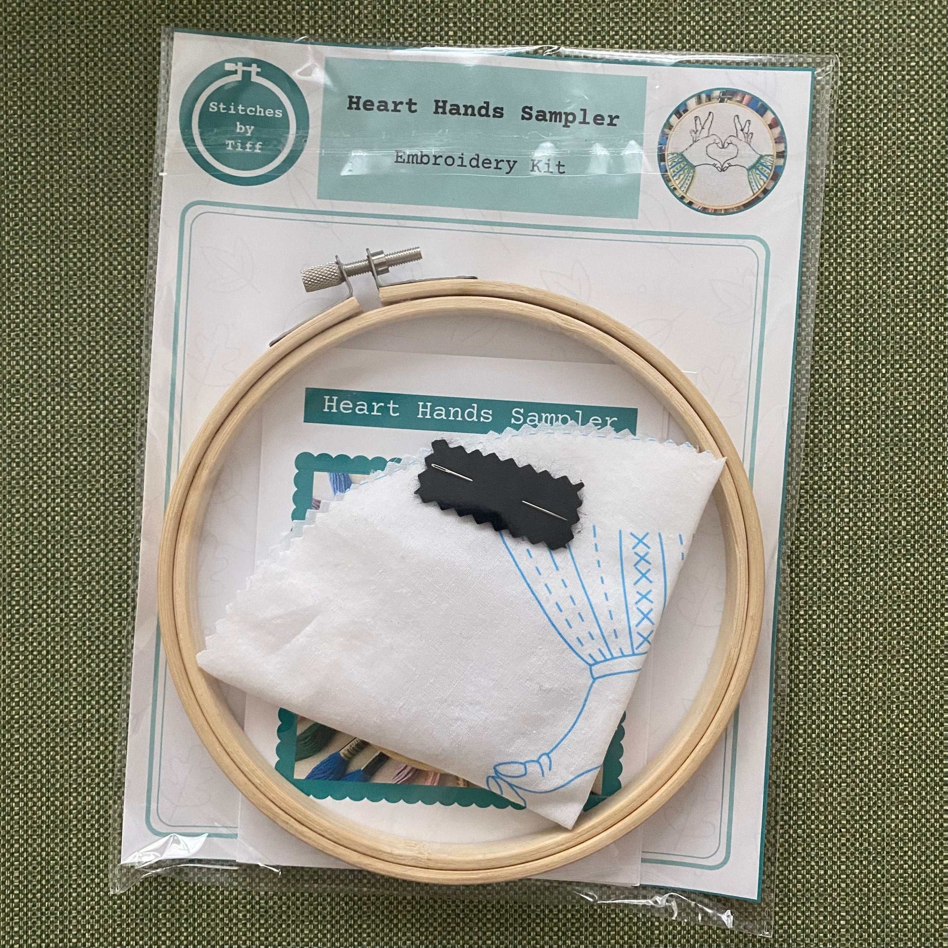 Heart Hands Sampler Embroidery Kit with bamboo hoop and preprinted fabric.
