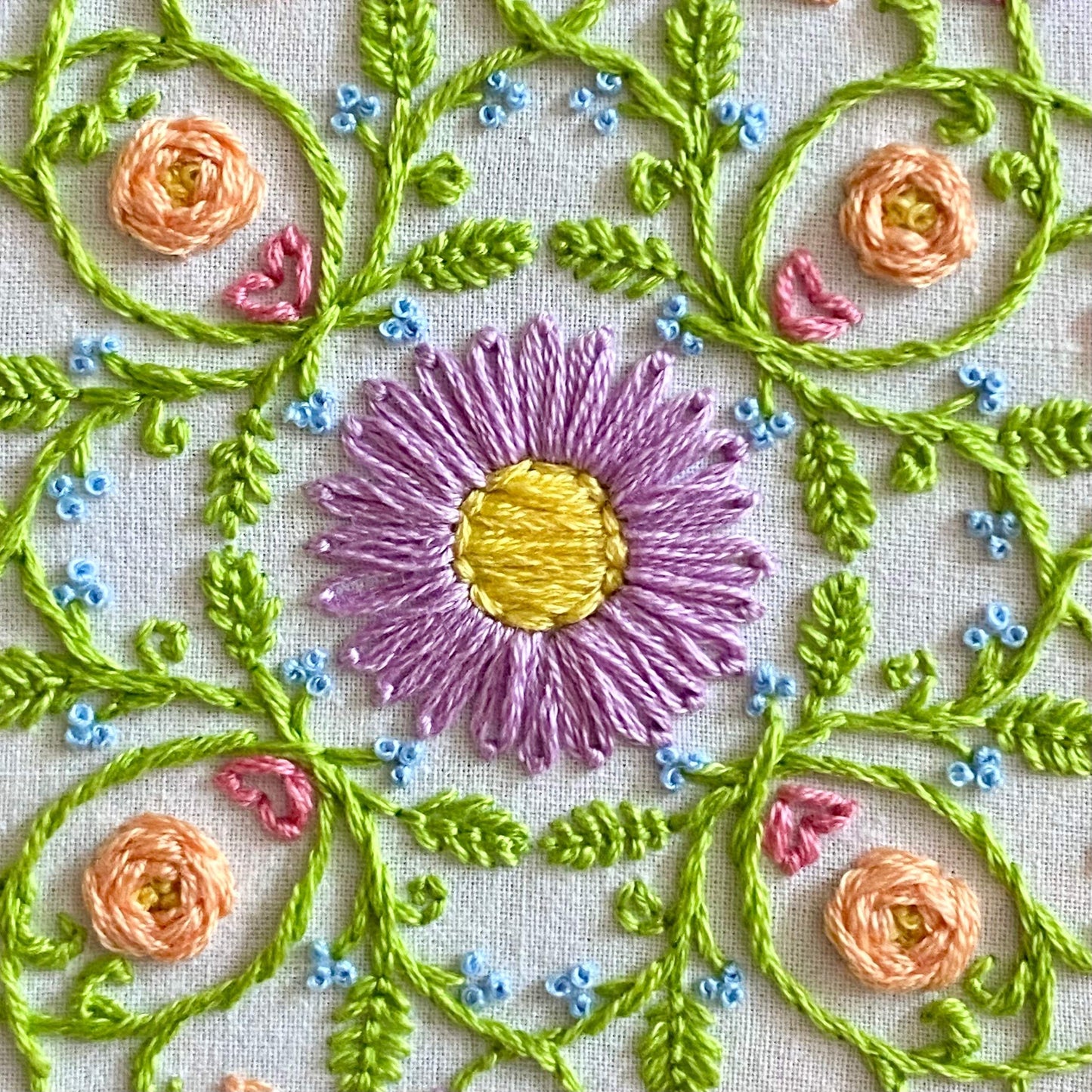 Bee mandala sampler embroidery kit with pastel florals and honeybees.