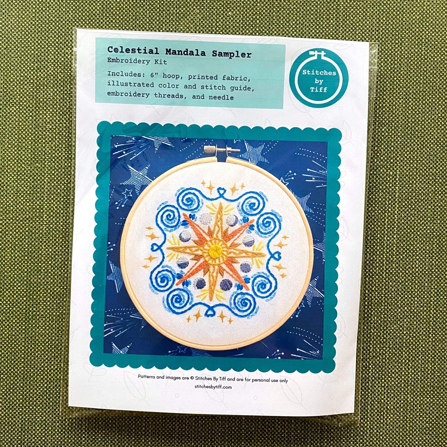 Celestial Mandala Sampler Embroidery Kit with bamboo hoop and preprinted fabric, featuring sun, moon, and stars design.