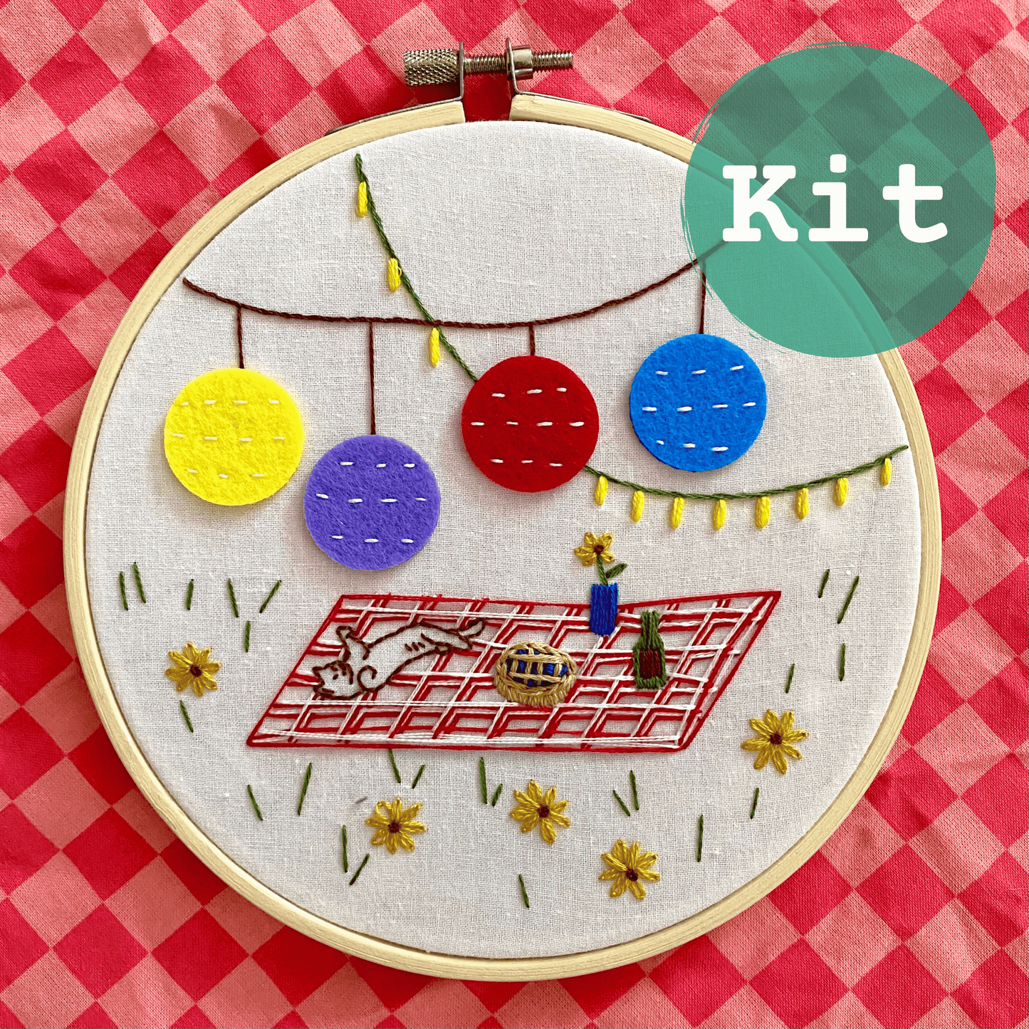 Purrfect Picnic Embroidery Kit with colorful felt appliqué lanterns and picnic scene.